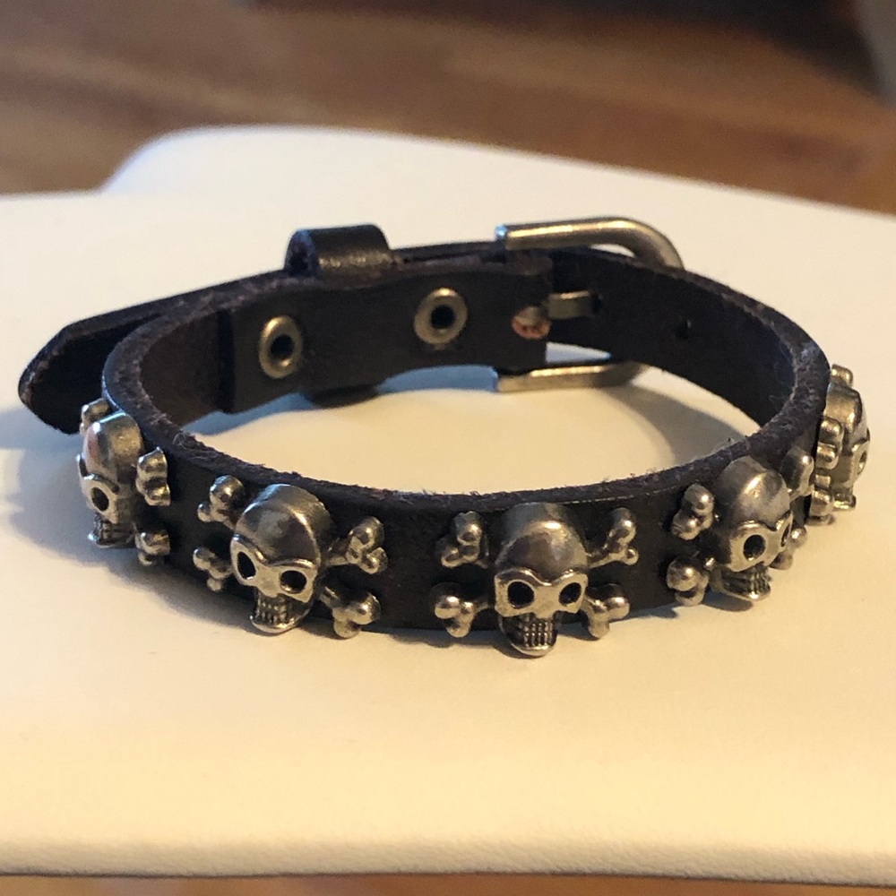 3/$35 Unisex Skull & Bones Bracelet. Buckle closure.